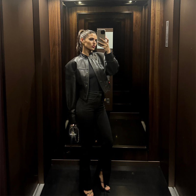 Women's short jacket in biker-bomber style made of vegan leather with a stand-up collar and oversized sleeves Shop Velvia