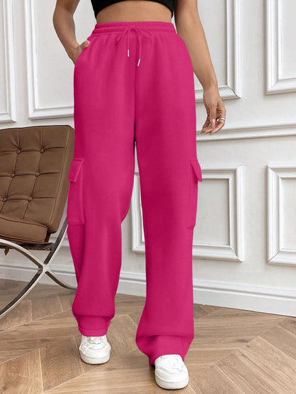 Ladies cargo jogging pants with high elastic waistband, drawstring, and wide leg Shop Velvia