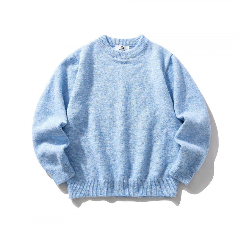 Unisex Oversize fine knit sweater with round neckline, ribbed cuffs, and mottled wool blend Shop Velvia