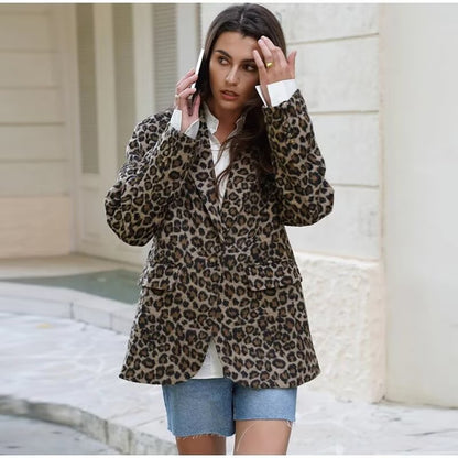 Women's leopard pattern longline blazer with falling lapel, single-button placket, and flap pockets Shop Velvia