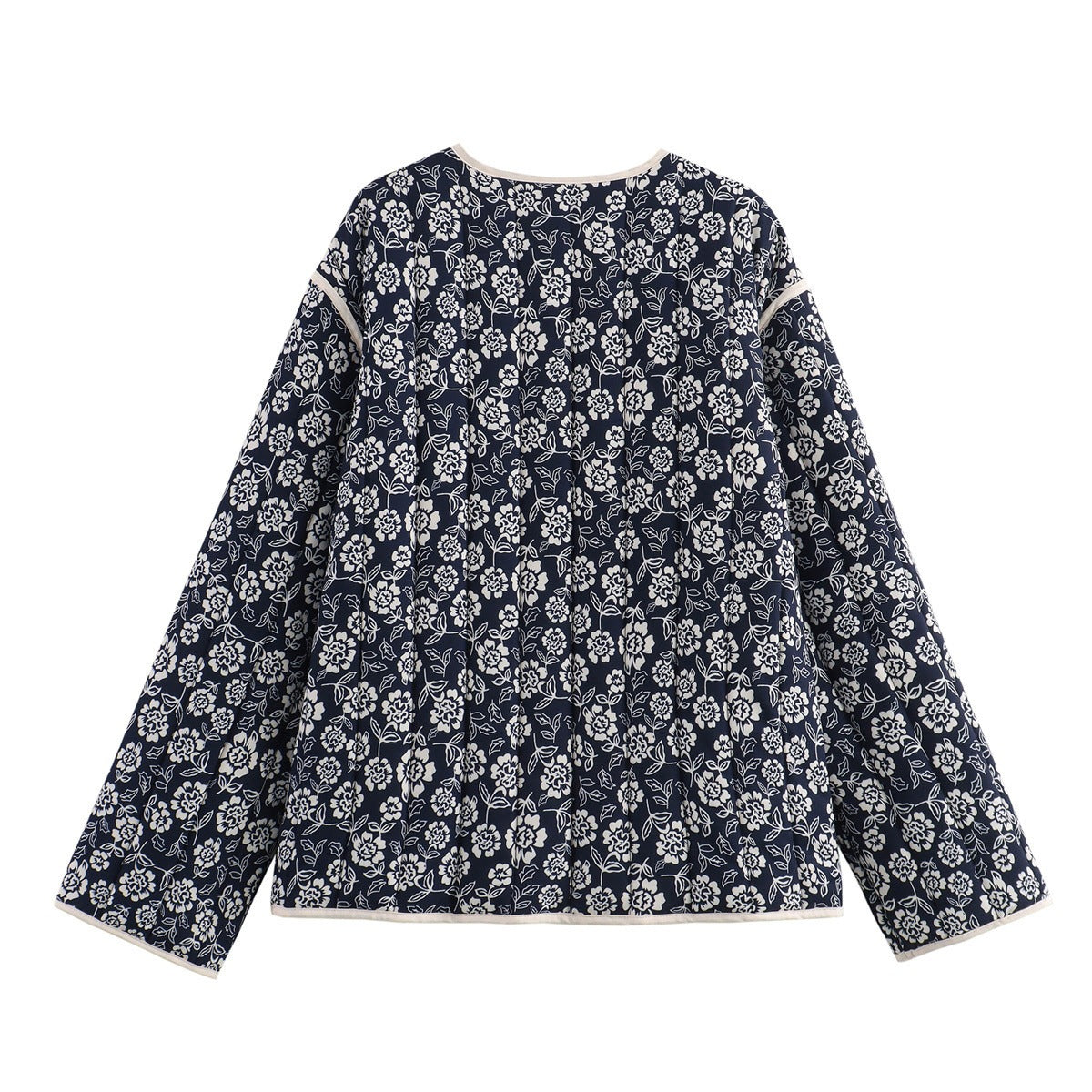 Ladies quilted jacket with floral allover, V-neck, contrast piping and patch pockets Shop Velvia