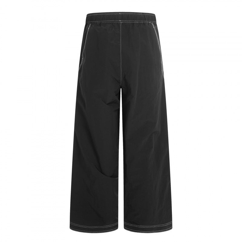 Women's wide pants with elastic waistband, drawstring and contrasting decorative seams Shop Velvia