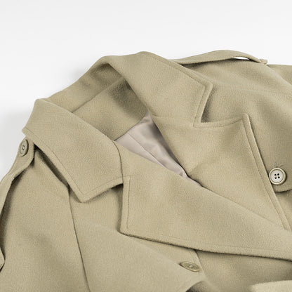 Women's maxi-length wool blend trench coat with belted tie, double-breasted button placket and shoulder epaulettes Shop Velvia