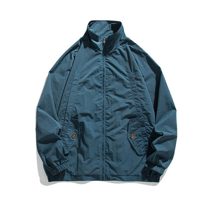 Men's Lightweight Oversized Field Jacket made of technical nylon with stand-up collar, concealed zipper, and flap pockets Shop Velvia