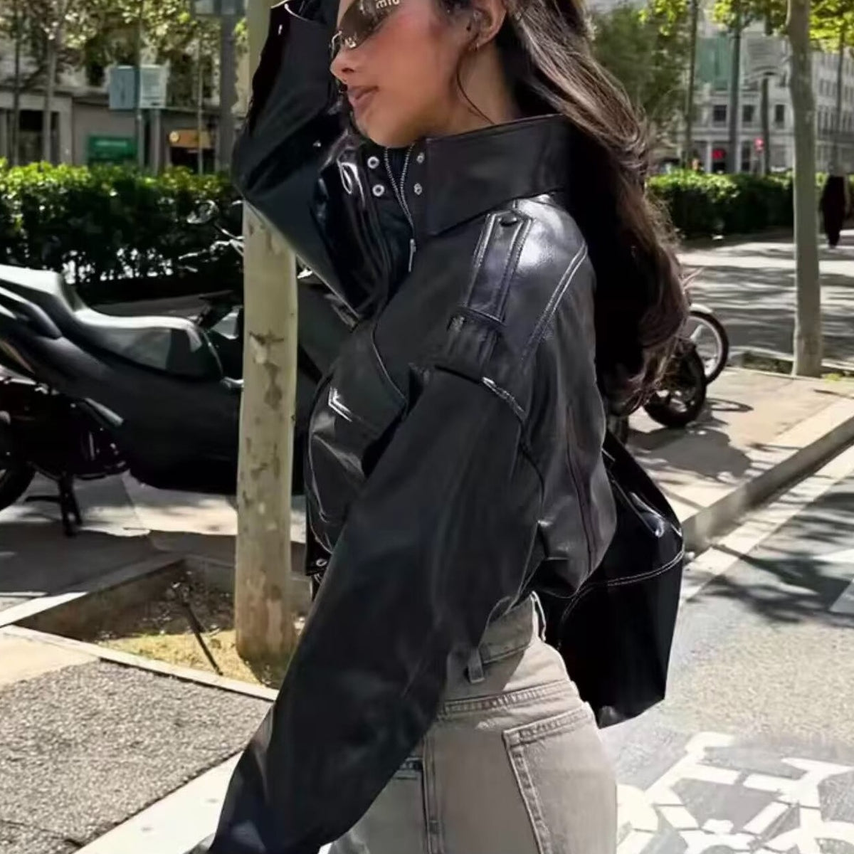Women Short-Cut Leather Bomber with High Stand Collar, Shoulder Straps and Flap Pockets Shop Velvia