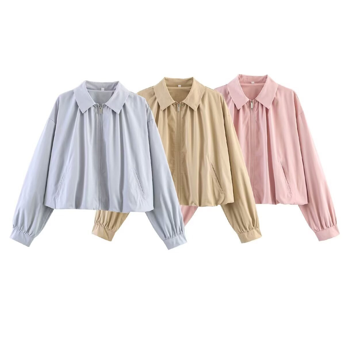 Women's cropped blouse with shirt collar, front zipper and gathered sleeve cuffs Shop Velvia