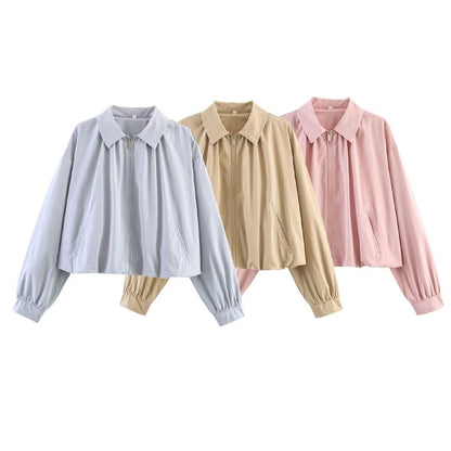 Women's cropped blouse with shirt collar, front zipper and gathered sleeve cuffs Shop Velvia