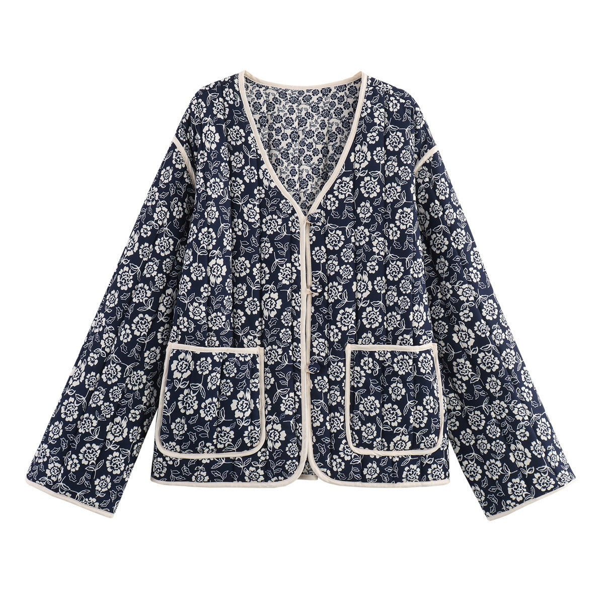 Ladies quilted jacket with floral allover, V-neck, contrast piping and patch pockets Shop Velvia