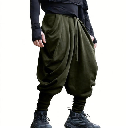Men's nan avant-garde harem pants with wrap front, elastic waistband, and slim lower leg Shop Velvia
