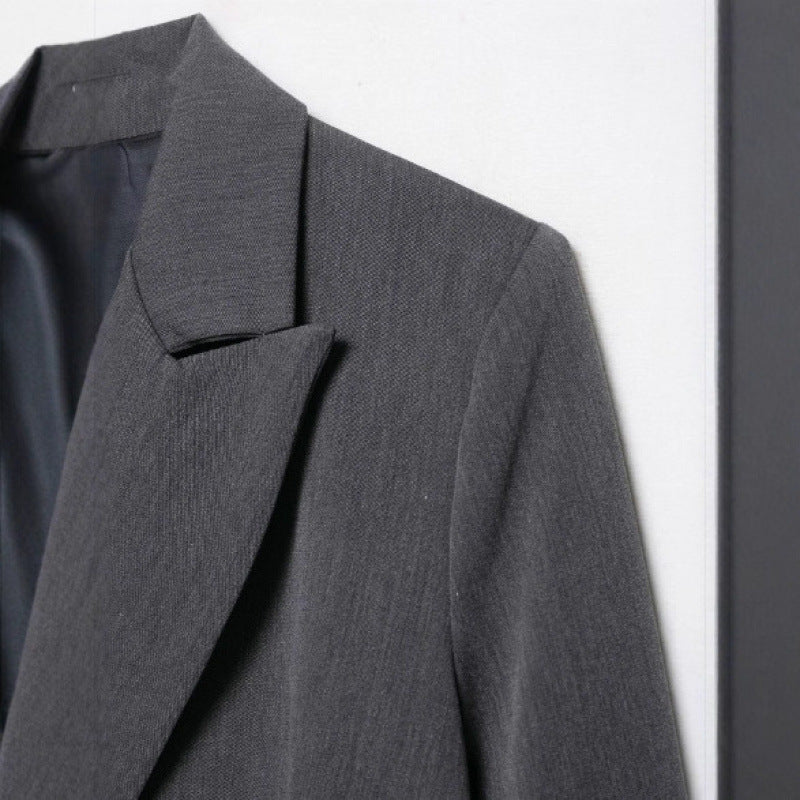 Women's oversized structured double-breasted blazer with wide lapels and patch pockets Shop Velvia