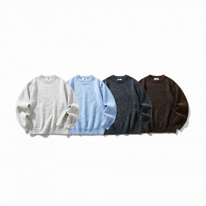 Unisex Oversize fine knit sweater with round neckline, ribbed cuffs, and mottled wool blend Shop Velvia