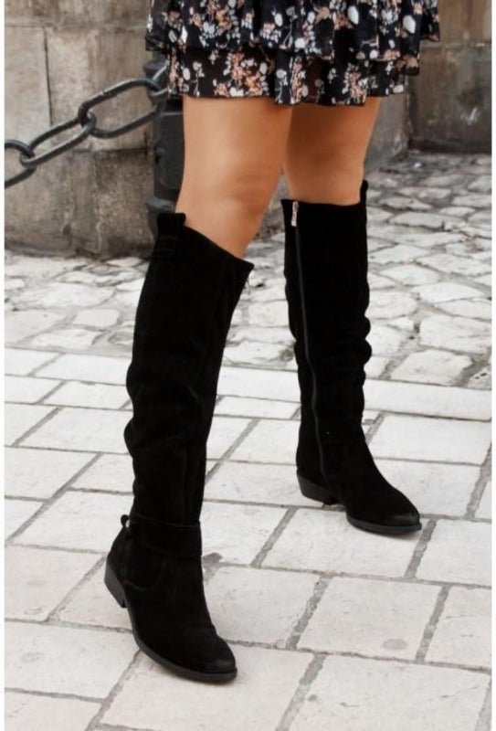 stylish leather boots, perfect for any occasion. Shop Velvia Shop Velvia