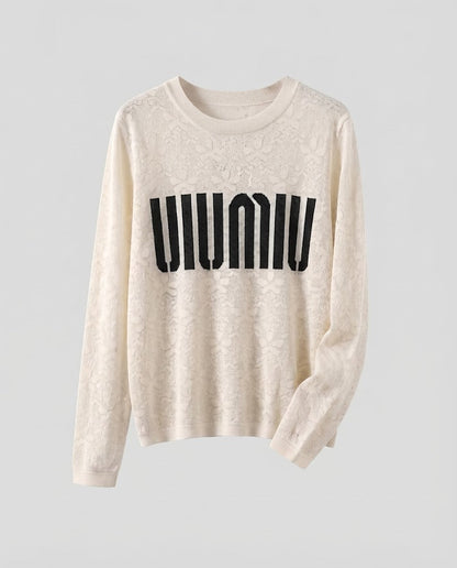 Women's fine knit pullover with round neckline, jacquard structure and logo front Shop Velvia