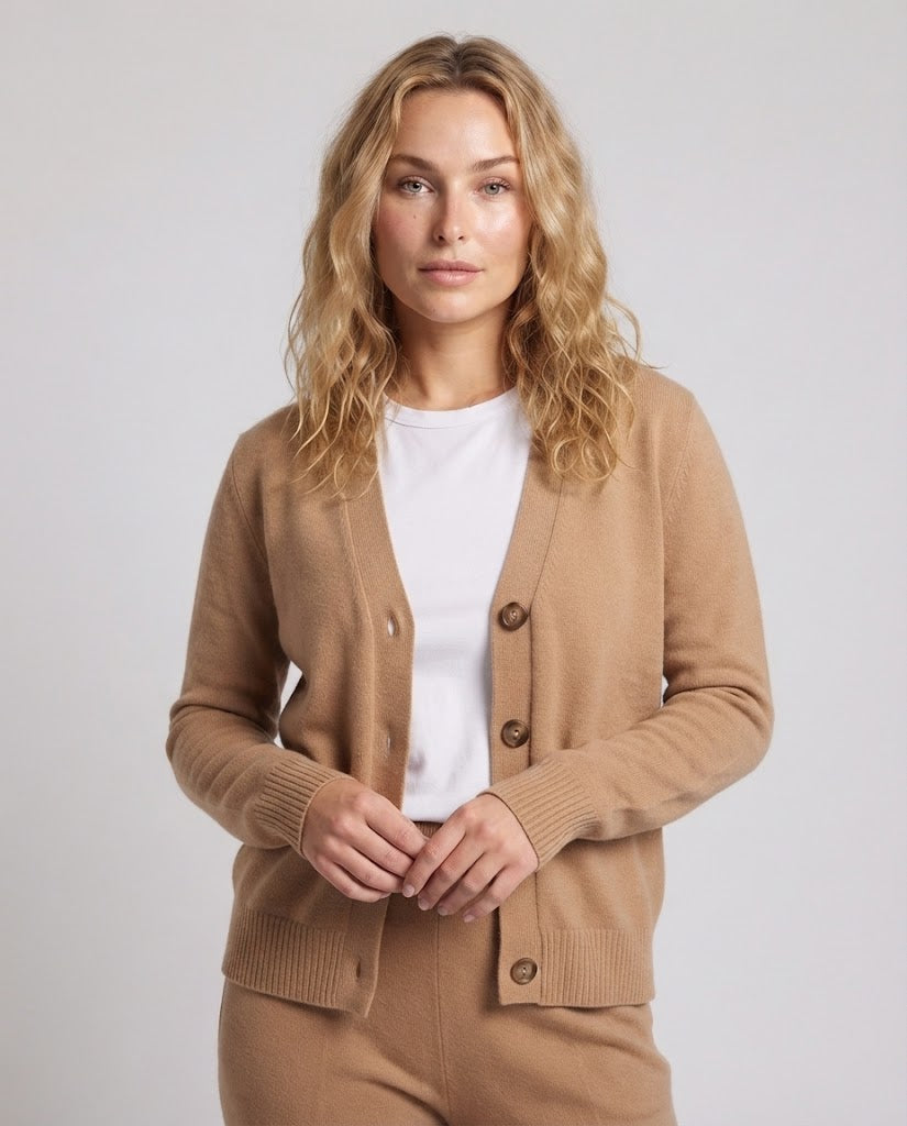 Women's fine-knit short cardigan with round neckline, fine ribbed edge, and subtly tailored silhouette Shop Velvia