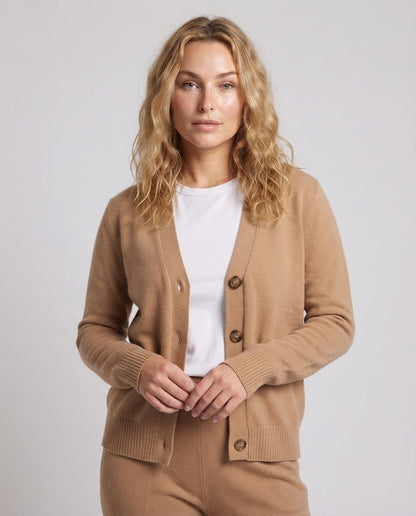 Women's fine-knit short cardigan with round neckline, fine ribbed edge, and subtly tailored silhouette Shop Velvia